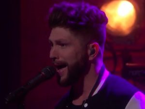 Watch High-Haired Chris Lane Hit the High Notes in Performance of “For Her” on “Conan”
